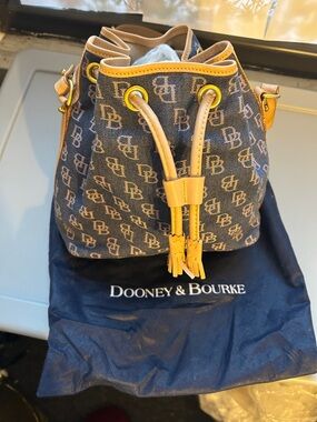 Dooney & Bourke denim Drawstring Bucket Bag with tan/beige Trim with dust bag